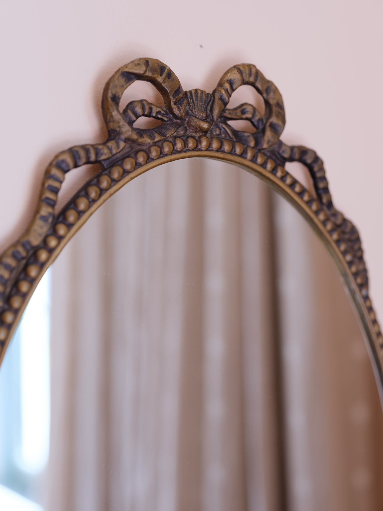 Vintage Oval Mirror with Decorative Bow Frame
