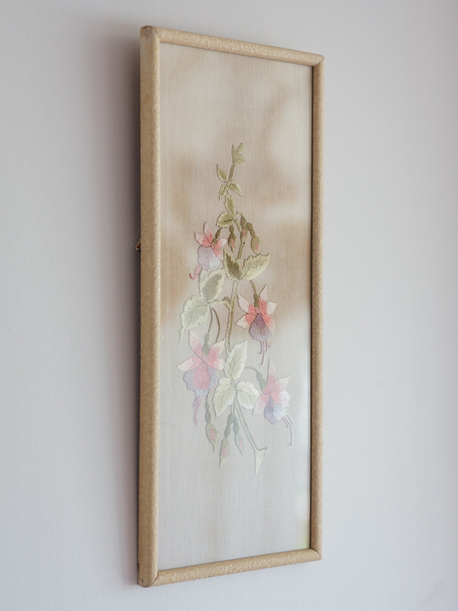 Antique fuchsia embroidery in vintage frame