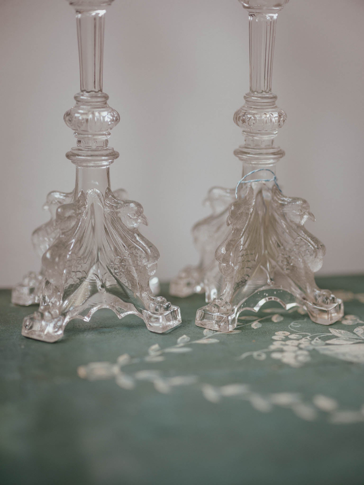 Pair of Victorian Pressed Glass Candlesticks with Figural Bird Bases