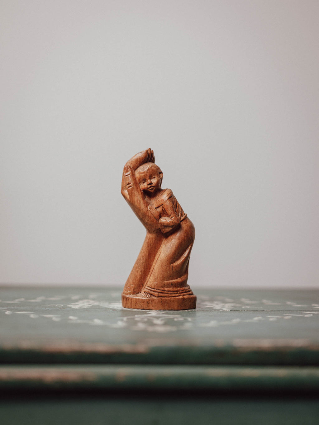 'In the Hand of God' Wooden Carved Figure