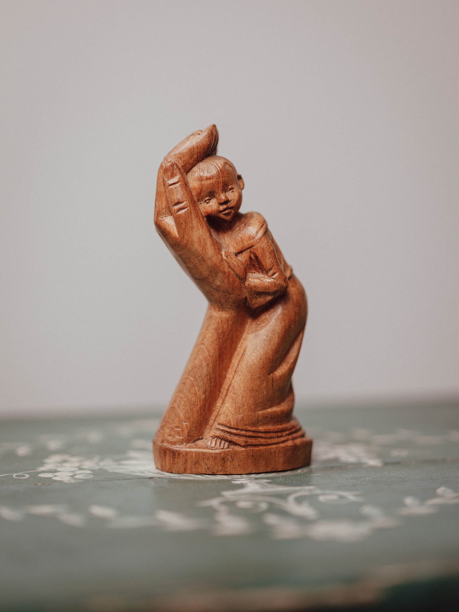'In the Hand of God' Wooden Carved Figure