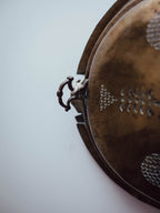Antique Brass Meat Cover Repurposed as Wall Hanging