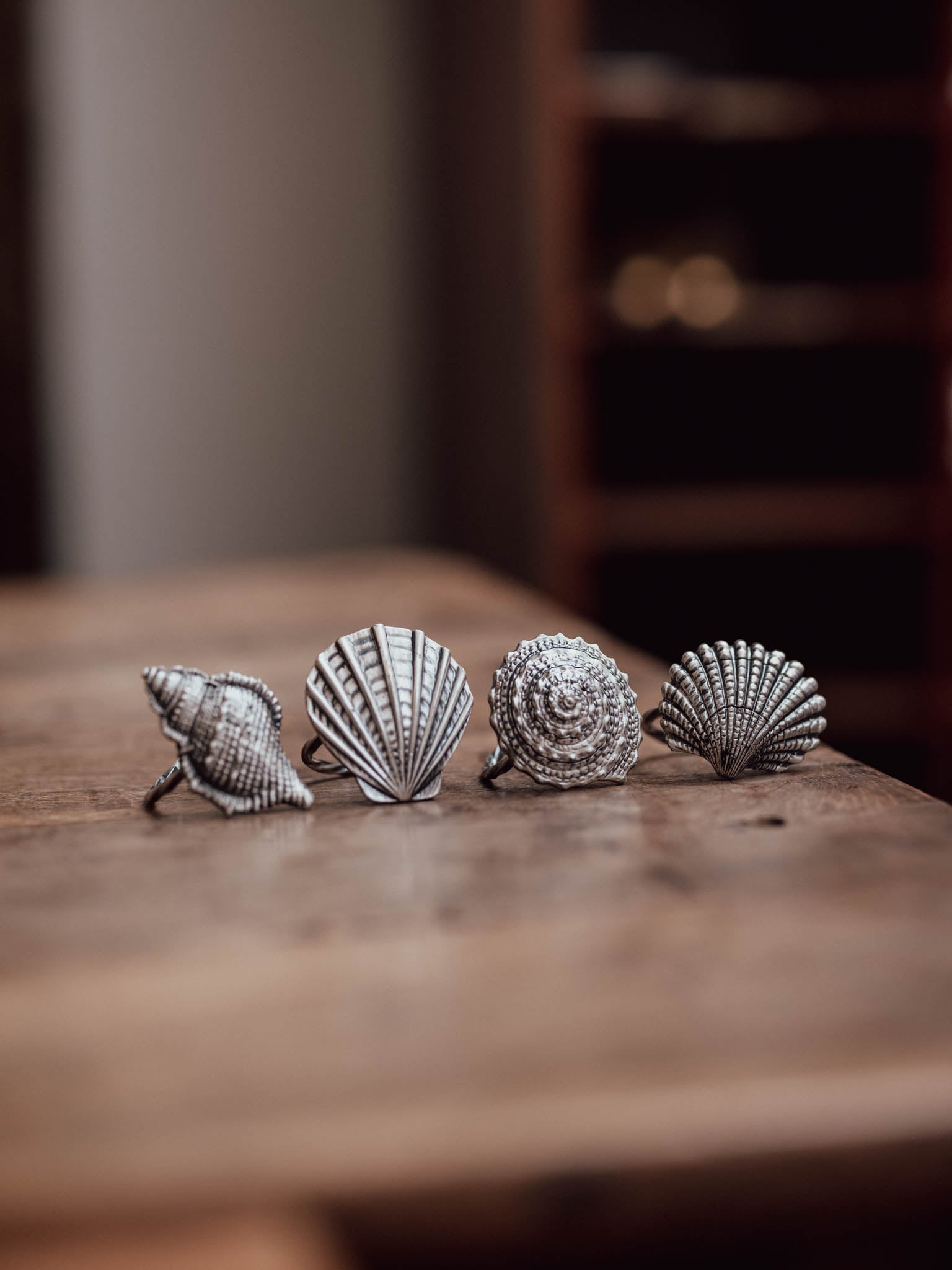 Set of Four Pewter Shell Napkin Rings
