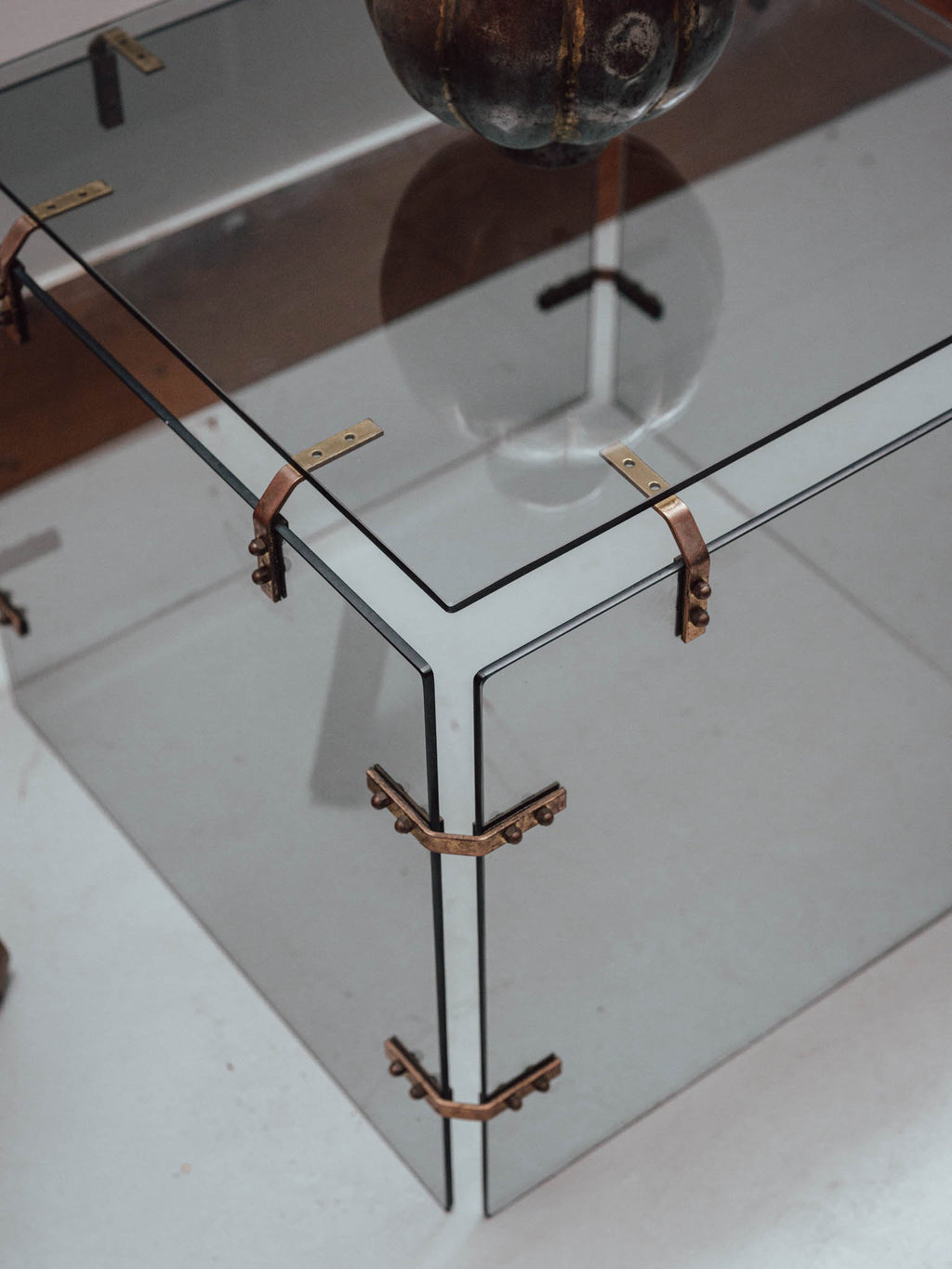Smoked Glass Side Table with Copper Brackets