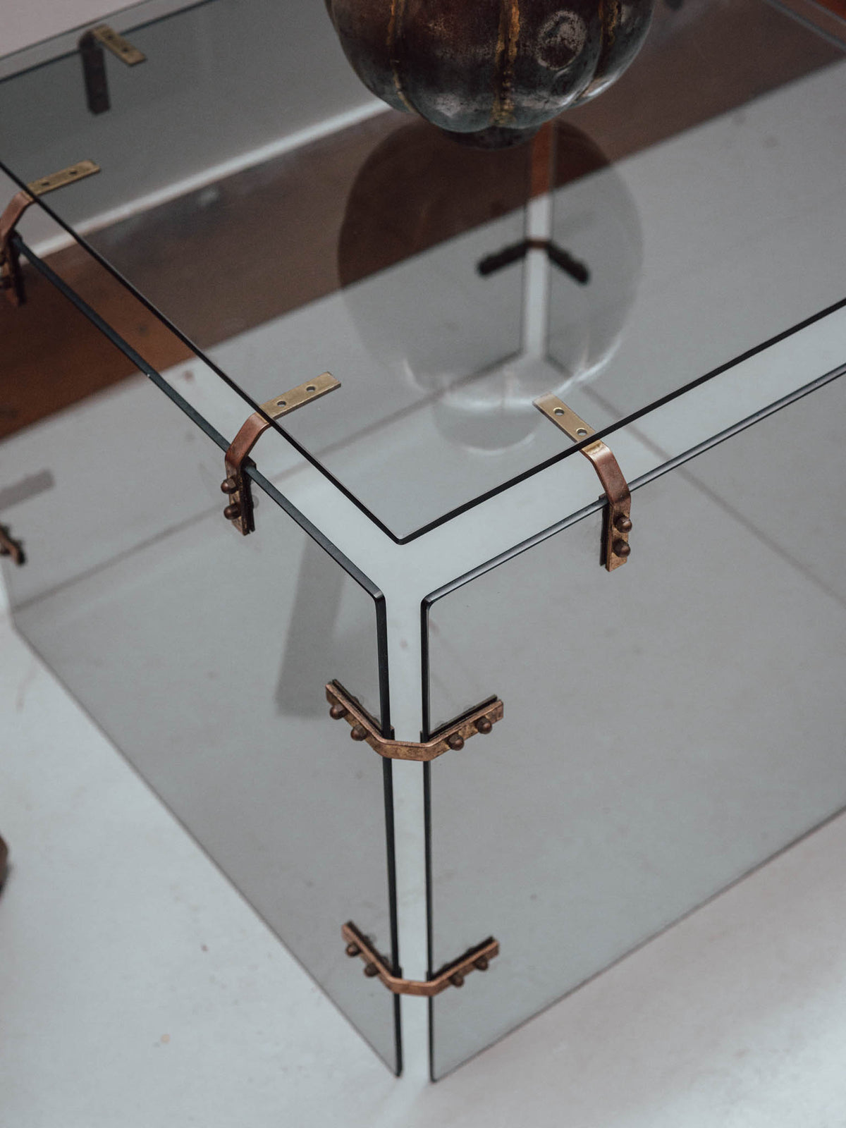 Smoked Glass Side Table with Copper Brackets