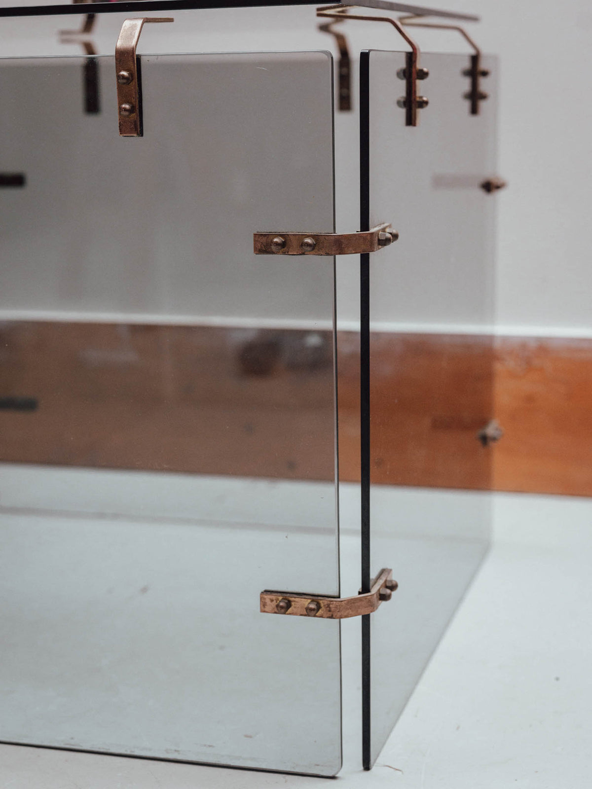 Smoked Glass Side Table with Copper Brackets