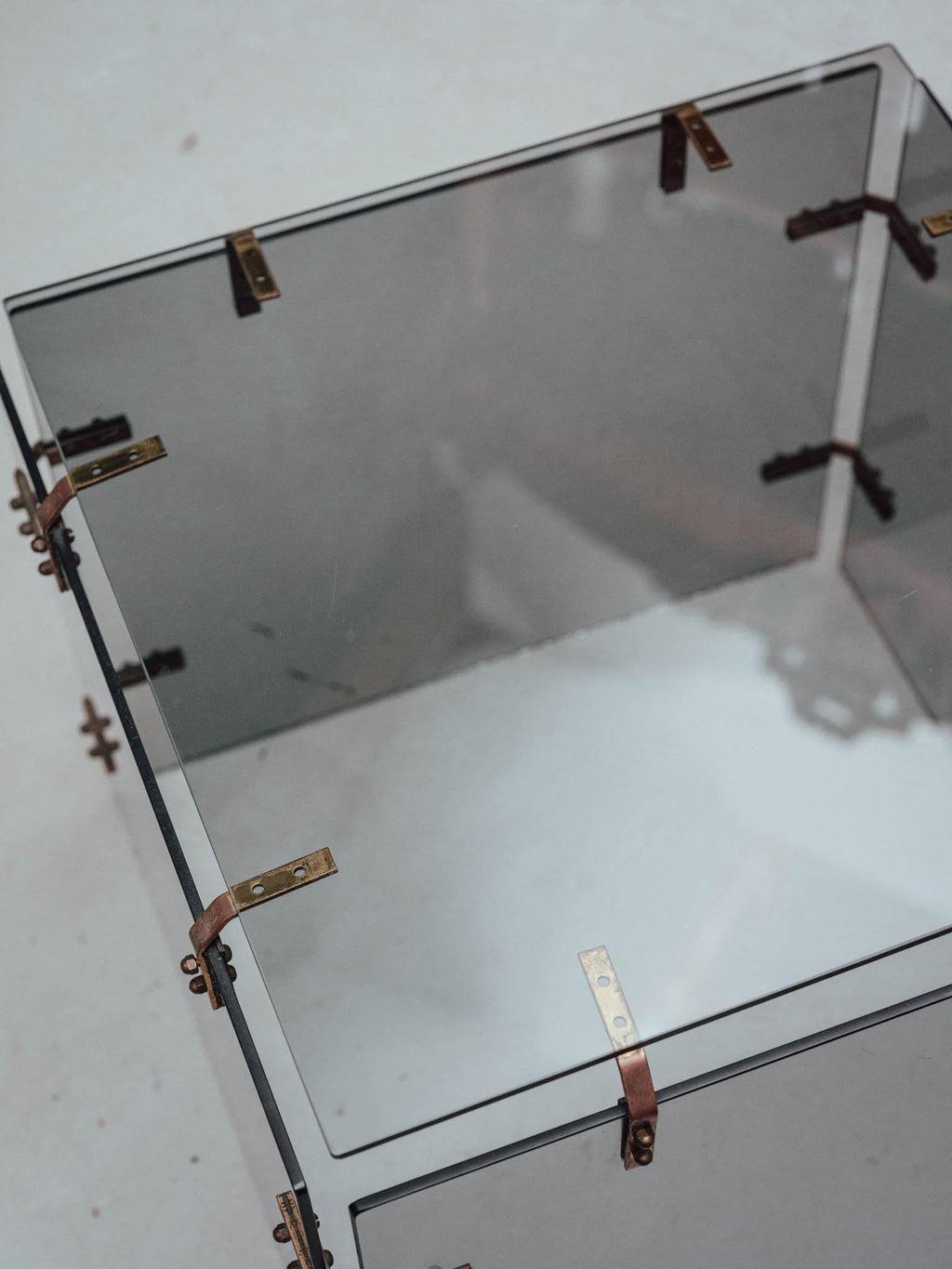 Smoked Glass Side Table with Copper Brackets