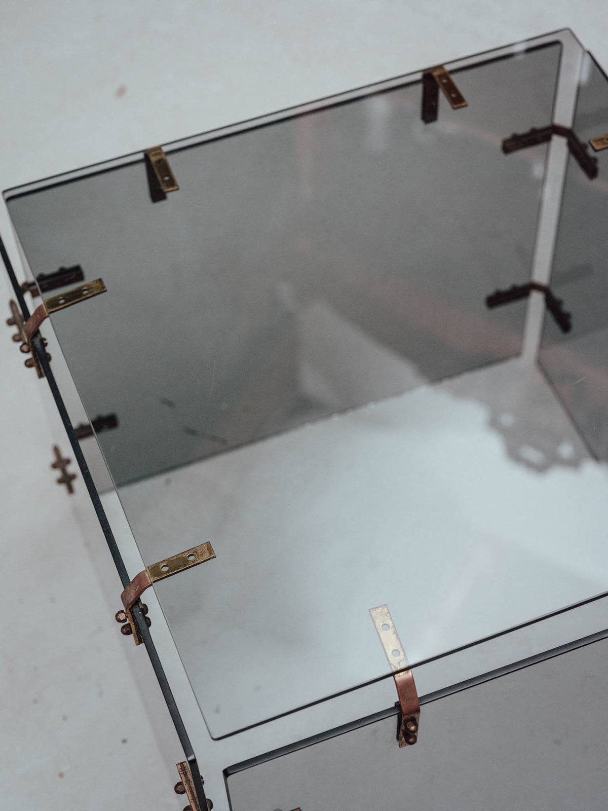 Smoked Glass Side Table with Copper Brackets