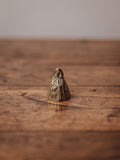 Brass Hooded Figure - Traitors Merch!