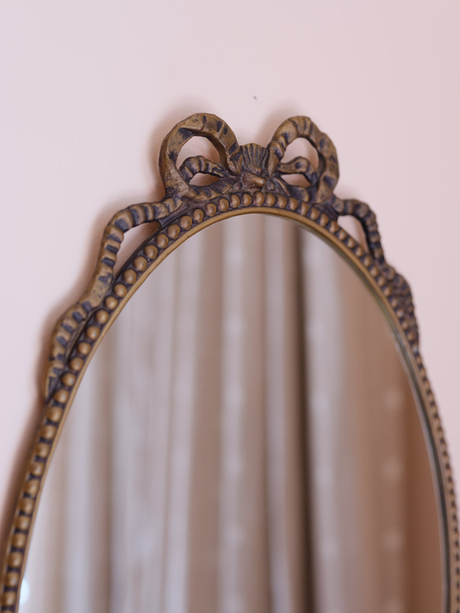 Vintage Oval Mirror with Decorative Bow Frame