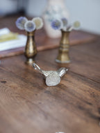 Mid-century metal bird bottle opener