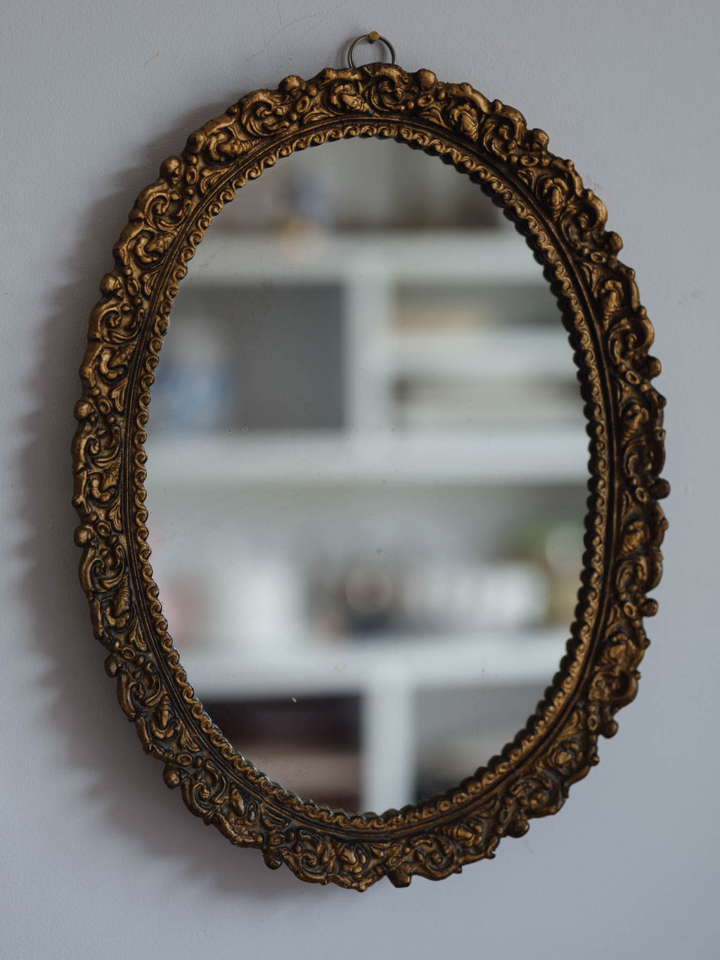 Vintage mirror with shell relief