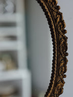 Vintage mirror with shell relief