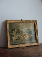 Framed still life print with Delft tiles