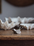 Mid-century metal bird bottle opener