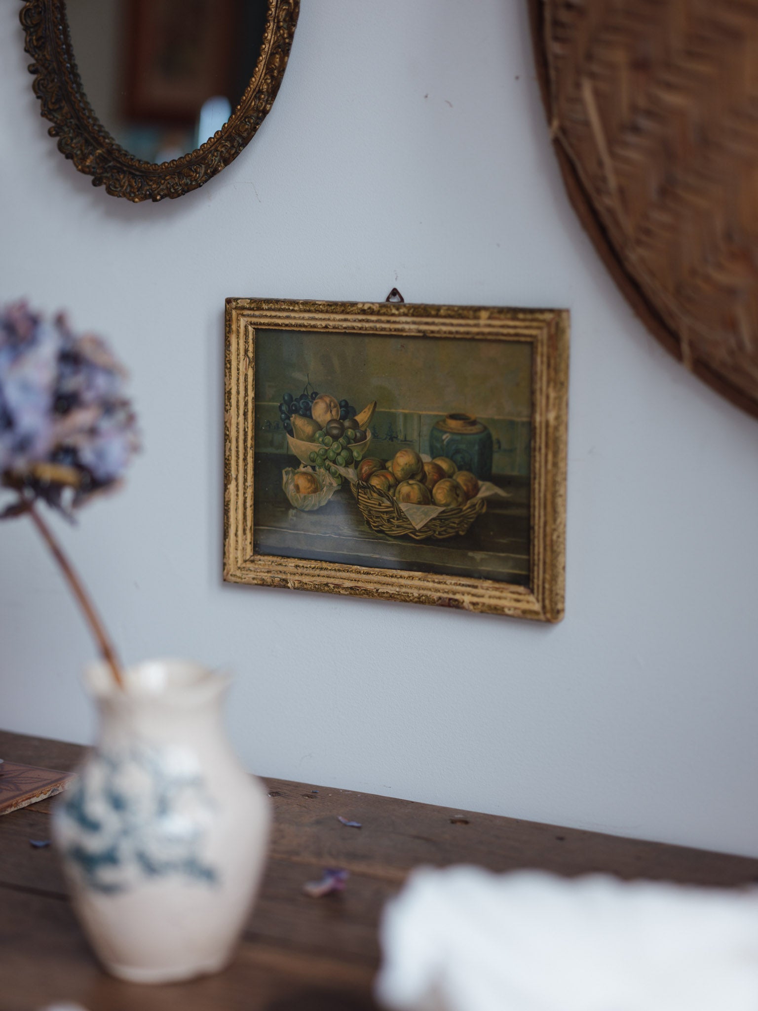 Framed still life print with Delft tiles