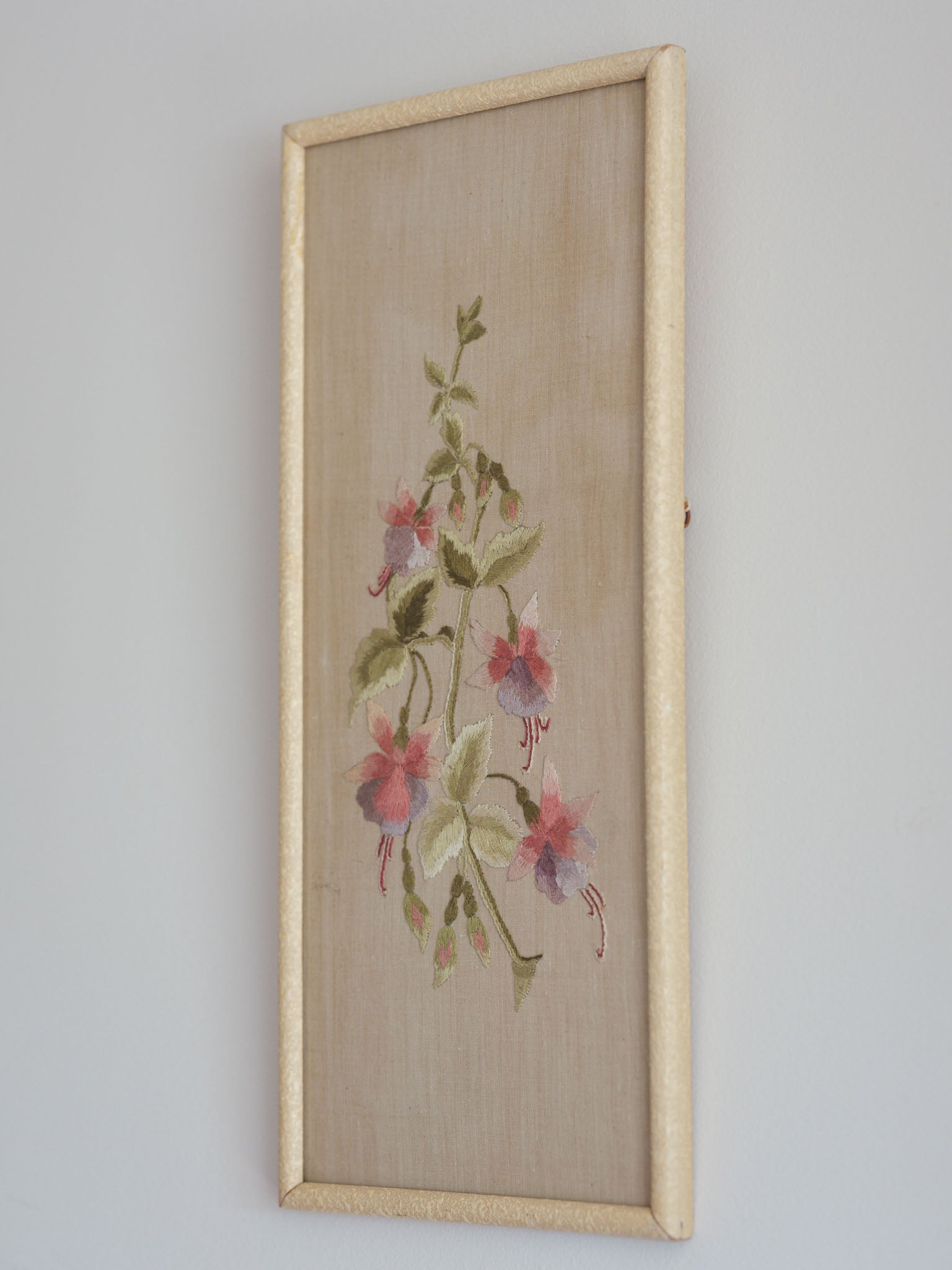 Antique fuchsia embroidery in vintage frame