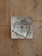 Antique stainless steel suture - original packaging