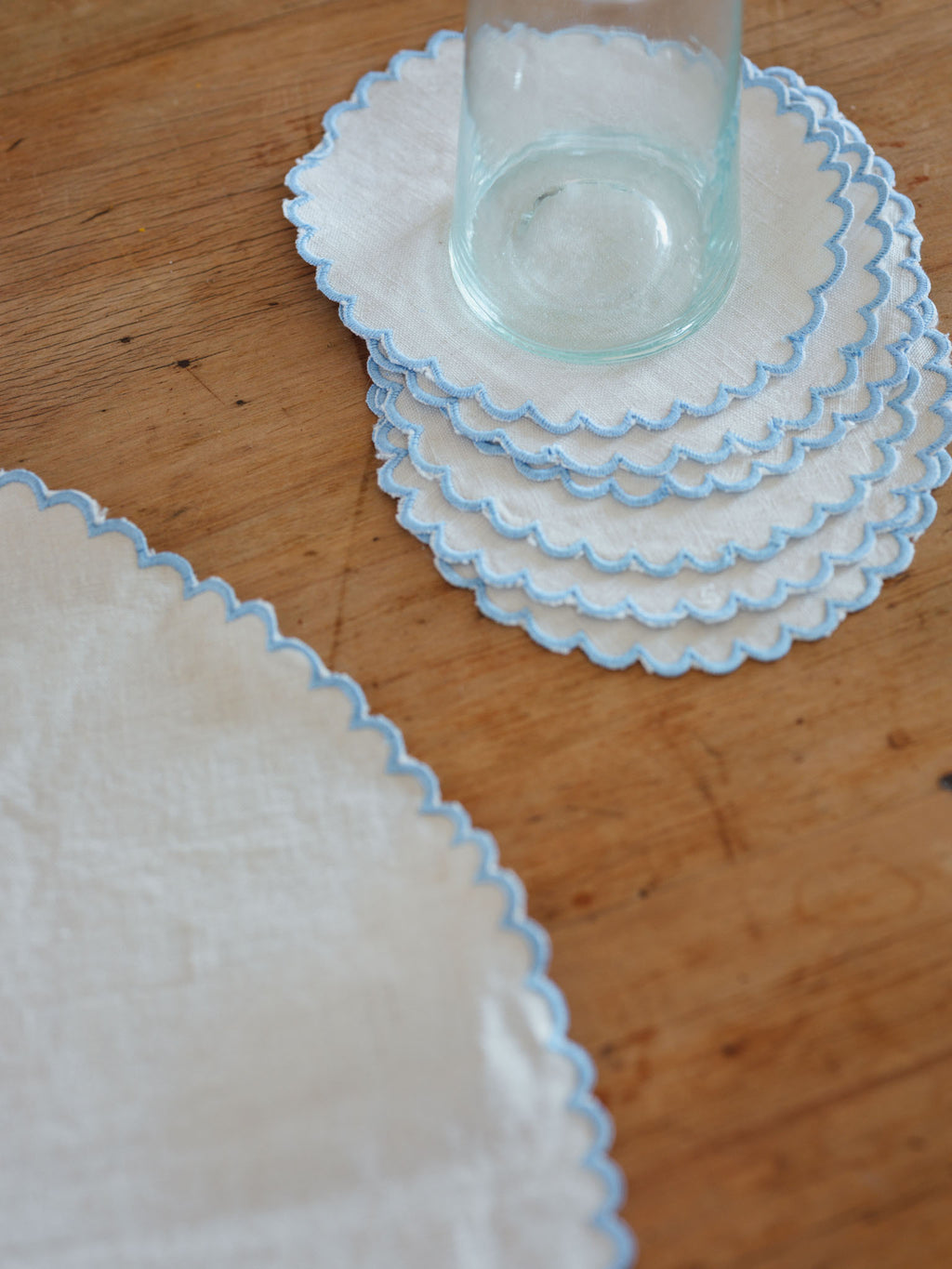Scalloped linen vintage placemats - cornflower blue edges