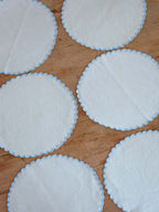 Scalloped linen vintage placemats - cornflower blue edges