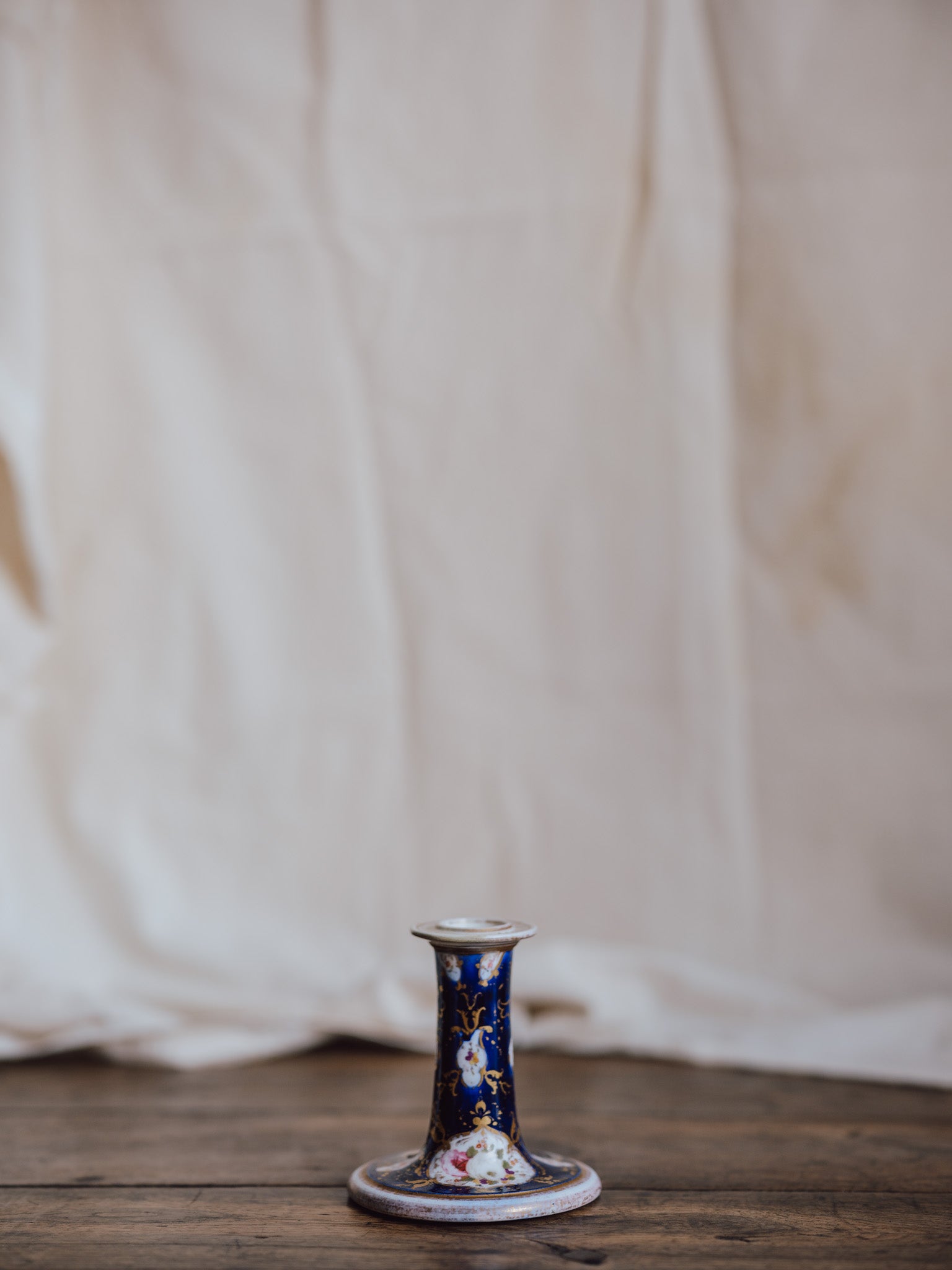 Charming Floral and Gilded Candlestick