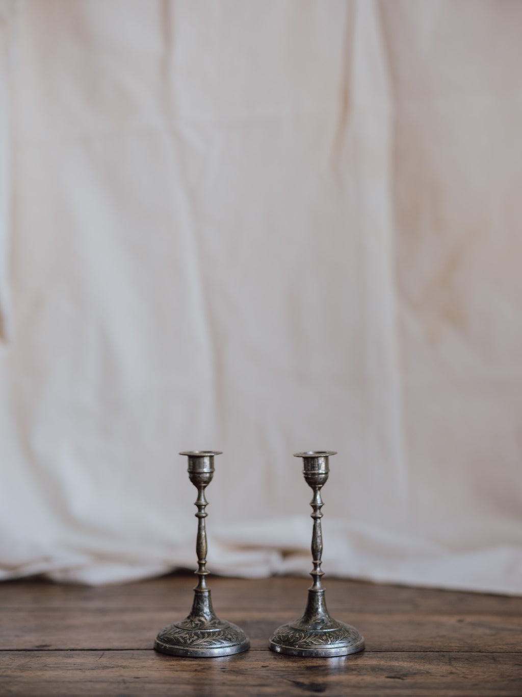Silver-Washed Engraved Indian Candlesticks – Pair